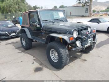 Salvage Jeep Wrangler