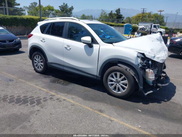  Salvage Mazda Cx
