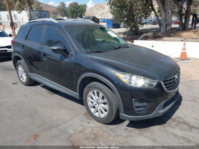  Salvage Mazda Cx