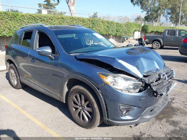  Salvage Mazda Cx
