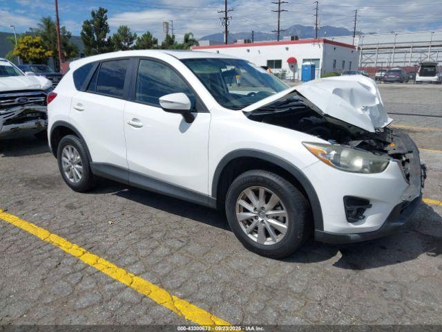  Salvage Mazda Cx