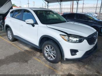  Salvage Mazda Cx